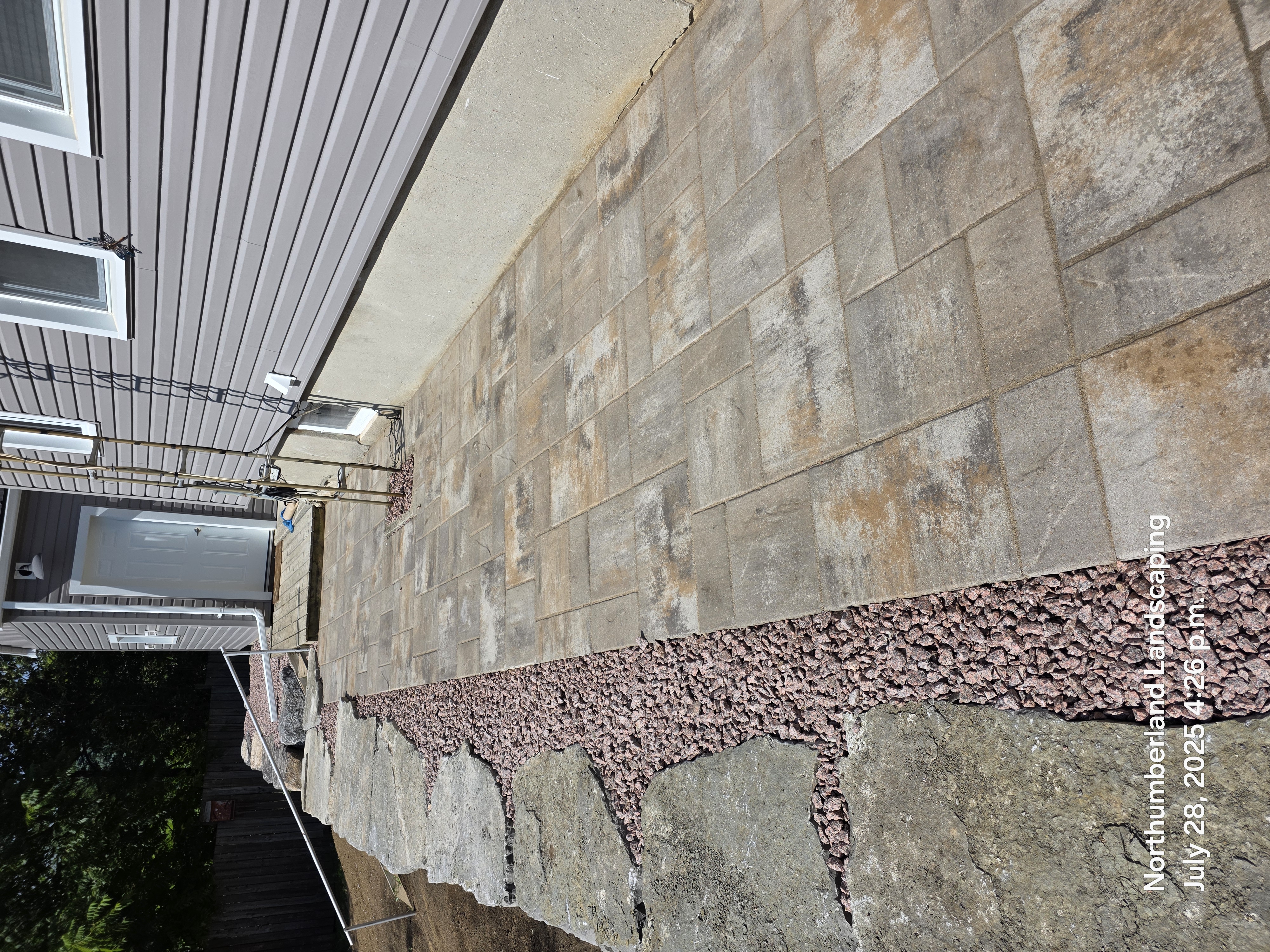 Armor stone retaining wall in Cobourg | Northumberland Landscaping